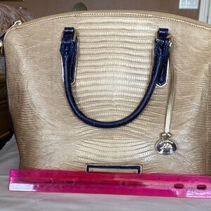 Vintage Brahmin gold with dark blue accents. GUC